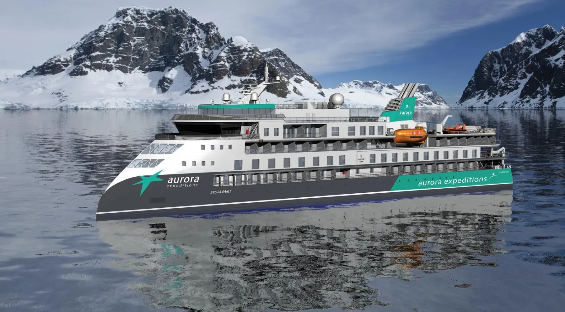 An Aurora Expeditions ship with its X-BOW hull among snow-covered Antarctic peaks